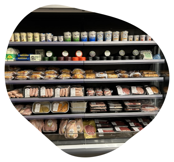 meat, cheeses and chickens on sale at The Farm Shop