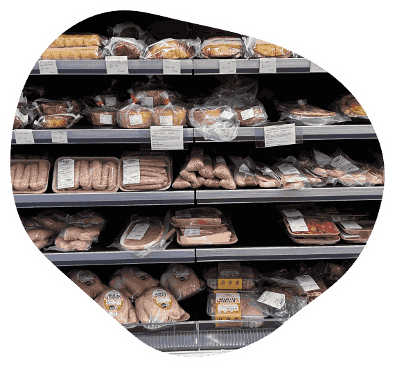 meat, cheeses and chickens on sale at The Farm Shop